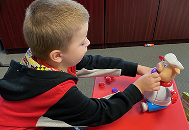 augmentative communication is uses play to help development